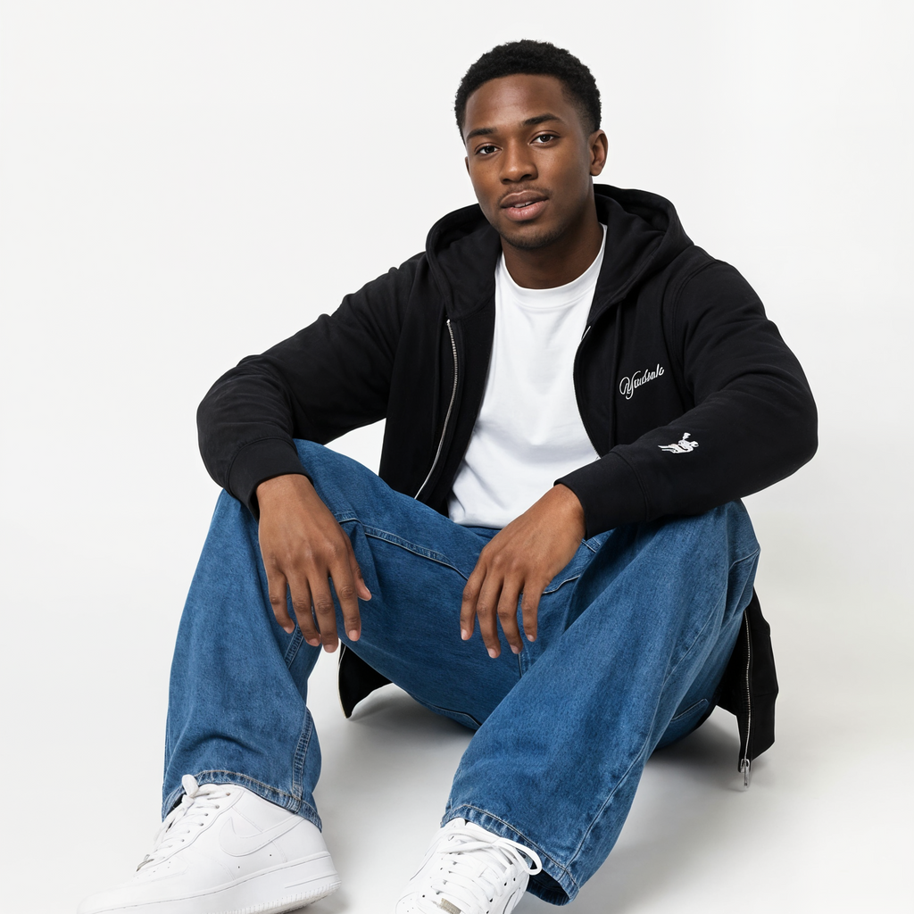 Person wearing a black hoodie, white t-shirt, blue jeans, and white sneakers on a white background